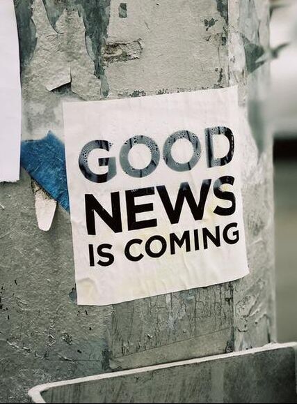 A white paper is attached to a wooden light post. The paper reads “Good news is coming.” Photo by Jon Tyson on Unsplash.