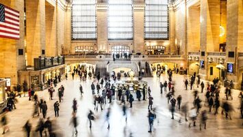 Picture of people walking around Grand Central Terminal.